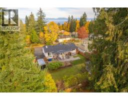 Living room - 6081 Parkway Dr, Nanaimo, BC V9V1G2 Photo 3