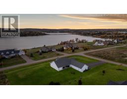 Living room - 8 Macneill Avenue, Clyde River, PE C0A1H1 Photo 3