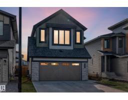 Family room - 731 166 Av Ne Ne, Edmonton, AB T5Y4J1 Photo 4