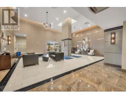 Living room - 520 2486 Old Bronte Road, Oakville, ON L6M0Y4 Photo 3