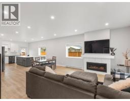 Living room - 212 Neecheah Street, Whitehorse,  Y1A5G9 Photo 3