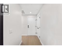 Living room - 9654 Benchland Road Unit 202, Lake Country, BC V4V0A5 Photo 2