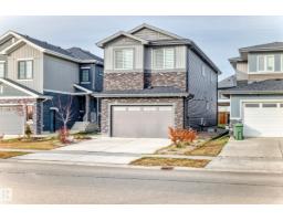 Family room - 5518 30 Av, Beaumont, AB T4X2B4 Photo 3