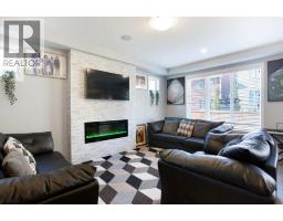 Living room - 158 Osborne Common Sw, Airdrie, AB T4B5G7 Photo 4