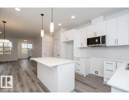 Dining room - 6423 63 St, Beaumont, AB T4X3E3 Photo 2
