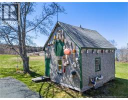 Dining nook - 19 North Road, Campobello Island, NB E5E1C1 Photo 3