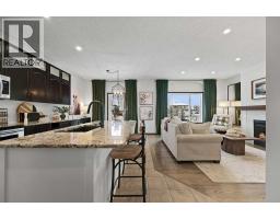 Kitchen - 103 Copeland Close Nw, Langdon, AB T0J1X2 Photo 2