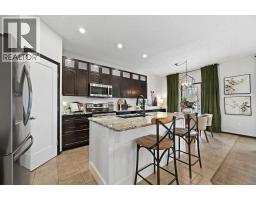 Dining room - 103 Copeland Close Nw, Langdon, AB T0J1X2 Photo 3