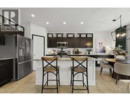 Den - 103 Copeland Close Nw, Langdon, AB T0J1X2 Photo 5