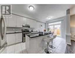 Family room - 106 Masterson Lane, Ajax, ON L1T0N6 Photo 5