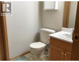 Primary Bedroom - Unit 2 4920 53 Avenue, Whitecourt, AB T7S1V7 Photo 5