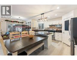 Dining room - 140 Fairways Drive Nw, Airdrie, AB T4B2R8 Photo 3