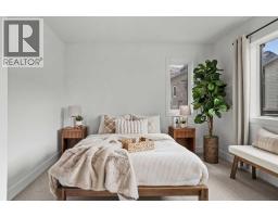 Bedroom - 105 1413 Mountain Avenue, Canmore, AB T1W1M3 Photo 3