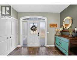 Living room - 816 800 Carriage Lane Place, Carstairs, AB T0M0N0 Photo 2