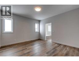 Primary Bedroom - 554 Rivercrest View, Cochrane, AB T4C2W9 Photo 4