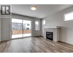 Kitchen - 554 Rivercrest View, Cochrane, AB T4C2W9 Photo 3