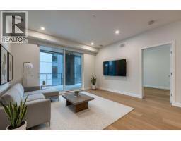 Living room - 9654 Benchland Drive Unit 201, Lake Country, BC V4V0C5 Photo 2