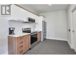 Living room - 403 20 Campus Trail, Huntsville, ON P1H0K2 Photo 3