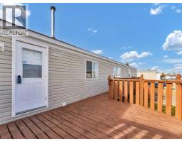 Living room - 57 Maple Drive W, Brooks, AB T1R1J2 Photo 3