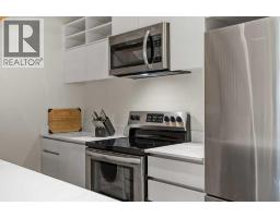 Living room - 202 B 1 Industrial Place, Canmore, AB T1W1Y1 Photo 4