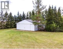 Family room - 26 Lake Ere Estates, Chestermere, AB T1X0M6 Photo 4