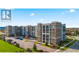 Living room - 304 610 Farmstead Drive, Milton, ON L9T7W2 Photo 2