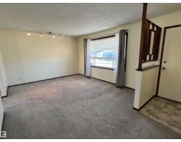 Family room - 9611 104 St, Morinville, AB T8R1C9 Photo 3