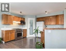 Living room - 37 Cimarron Meadows Bay, Okotoks, AB T1S2E4 Photo 3