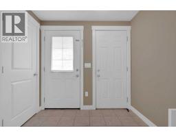 Living room - 87 Baysprings Way Sw, Airdrie, AB T4B0R7 Photo 2