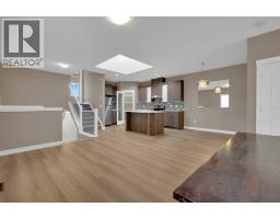 Dining room - 87 Baysprings Way Sw, Airdrie, AB T4B0R7 Photo 3