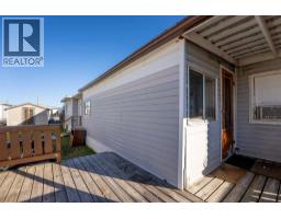 Living room - 19 5853 4 Street, Claresholm, AB T0L0T0 Photo 5
