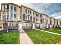 Dining room - 52 145 Chelsea Mews, Chestermere, AB T1X3H2 Photo 3