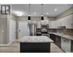 Living room - 109 415 Maningas Bend, Saskatoon, SK S7W0T6 Photo 3