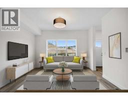 Living room - 1206 525 River Heights Drive, Cochrane, AB T4C3E3 Photo 4