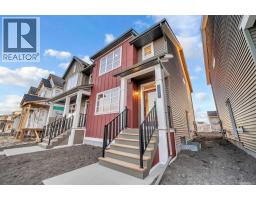 Den - 5073 Harmony Circle, Rural Rocky View County, AB T3Z0K3 Photo 3