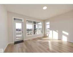 Great room - 172 Stonehouse Wy, Leduc, AB T9E1R2 Photo 4