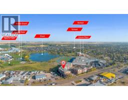 Living room - 2416 604 East Lake Boulevard, Airdrie, AB T4A0G6 Photo 2