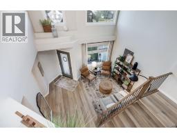 Family room - 720 Woodside Drive Nw, Airdrie, AB T4B2H1 Photo 4