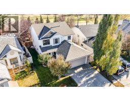 Living room - 720 Woodside Drive Nw, Airdrie, AB T4B2H1 Photo 2
