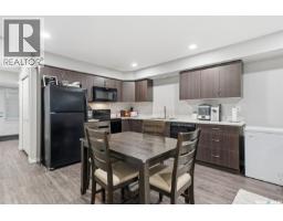 Living room - 213 110 Akhtar Bend, Saskatoon, SK S7W0Y9 Photo 4
