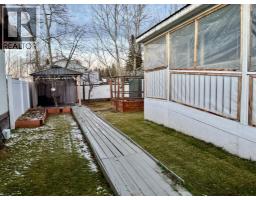Living room - 105 5311 60 Street, Rocky Mountain House, AB T4T1N2 Photo 3
