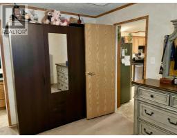 Primary Bedroom - 105 5311 60 Street, Rocky Mountain House, AB T4T1N2 Photo 4