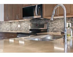 Family room - 101 5151 Windermere Bv Nw, Edmonton, AB T6W2K4 Photo 4