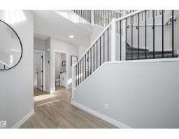 Family room - 7027 54 Av, Beaumont, AB T4X2Z9 Photo 4