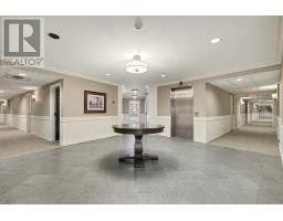 Living room - 205 40 Pearl Street, Smiths Falls, ON K7A5B5 Photo 2