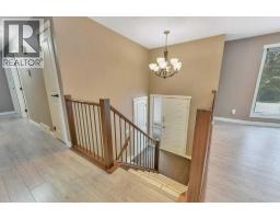 Living room - 121 27475 Township Road 380, Rural Red Deer County, AB T4S2B7 Photo 3