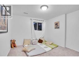 Bedroom - 1004 720 Willowbrook Road Nw, Airdrie, AB T4B2Y9 Photo 2