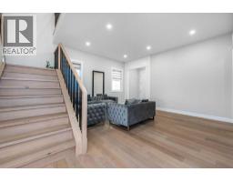 Living room - 66 Waterford Road, Chestermere, AB T1X2M7 Photo 2