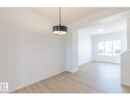 Dining room - 90 Dansereau Wy, Beaumont, AB T4X3E2 Photo 2