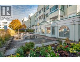 Laundry room - 1329 Klo Road Unit 106, Kelowna, BC V1W3N9 Photo 2